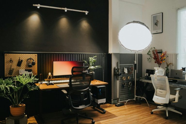Stylishly designed home office with ergonomic chairs and ambient lighting.